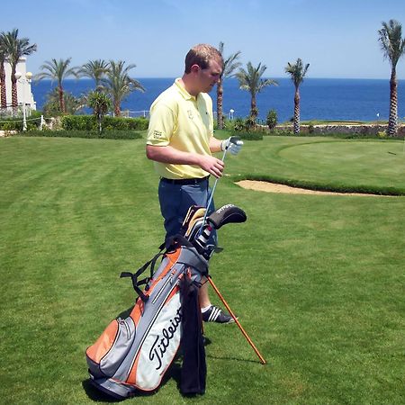 斯特拉迪梅尔海滩酒店&Spa 沙姆沙伊赫 外观 照片 Golf player with a golf bag